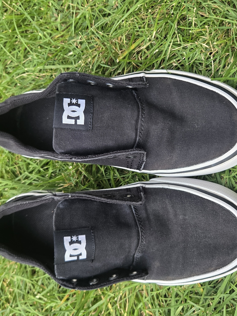 DC Black Canvas Slip-On Sneakers